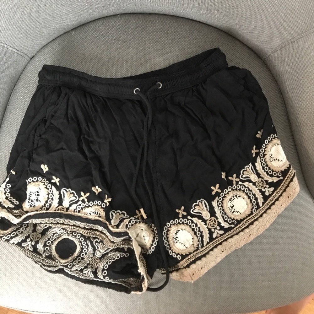 Black and gold flowy shorts